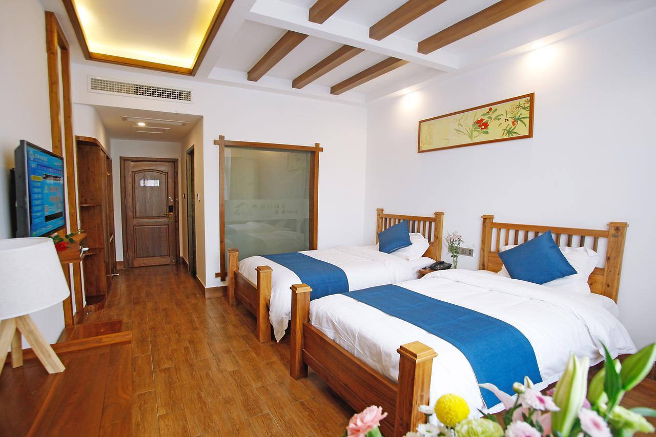 Guihua Road 106Th Hostel Zhangjiajie Bagian luar foto